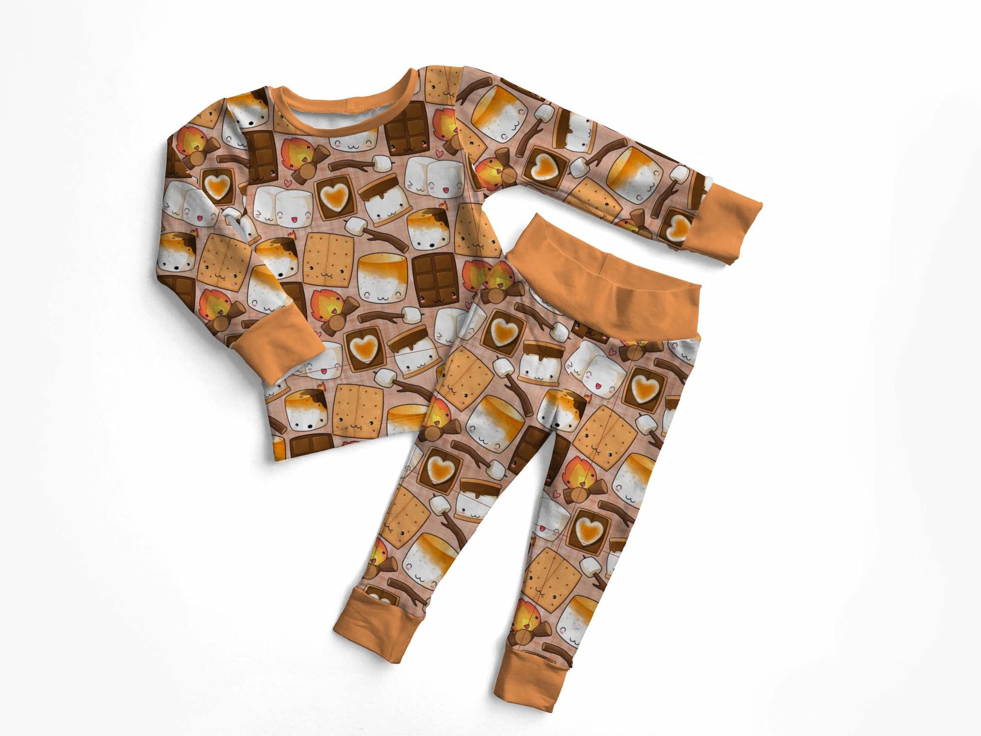 a pair of bamboo pajamas featuring a smores inspired print called making s'more memories laying on a white background