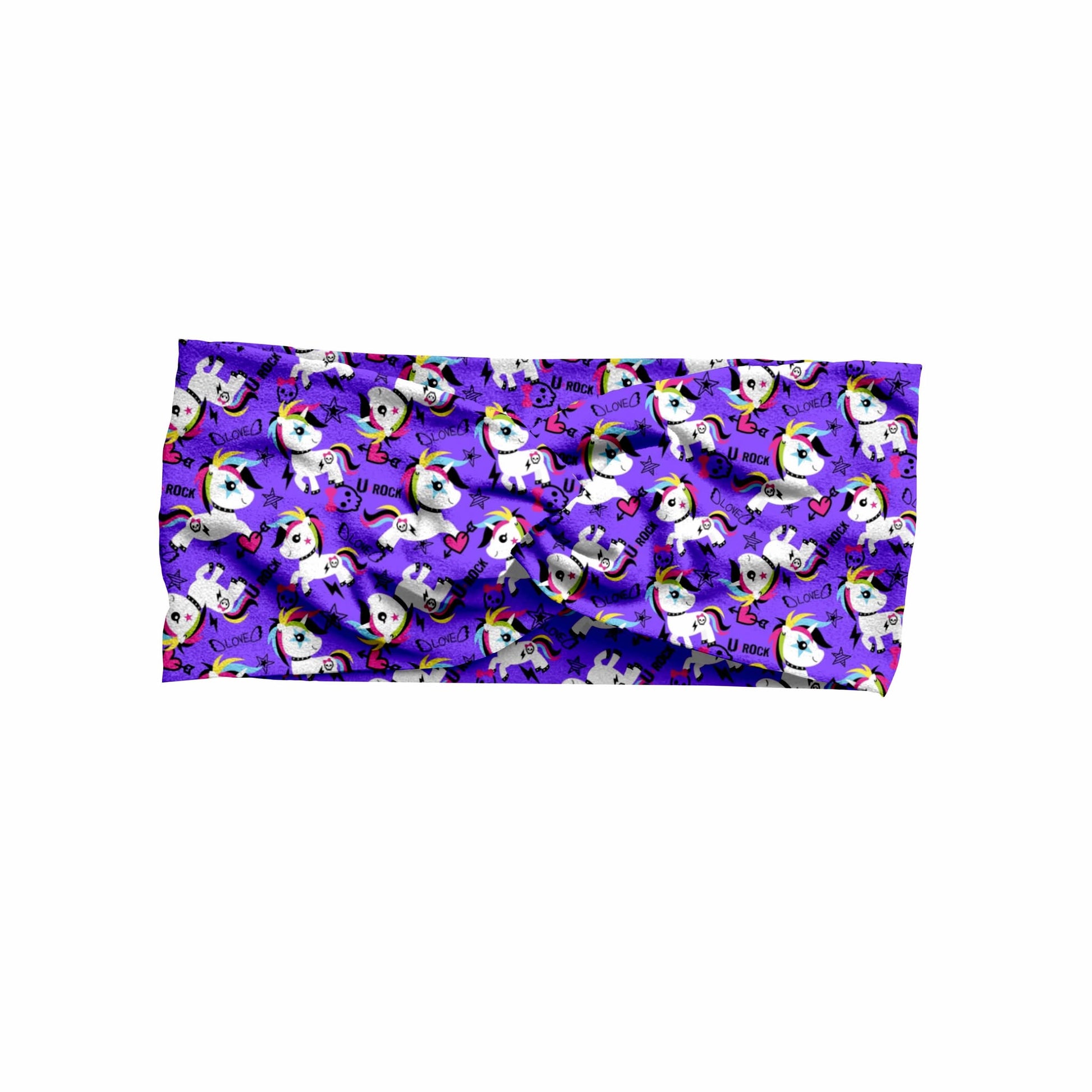 A headband with a pattern of cartoon-style unicorns with rainbow manes and skull tattoos on a purple background.