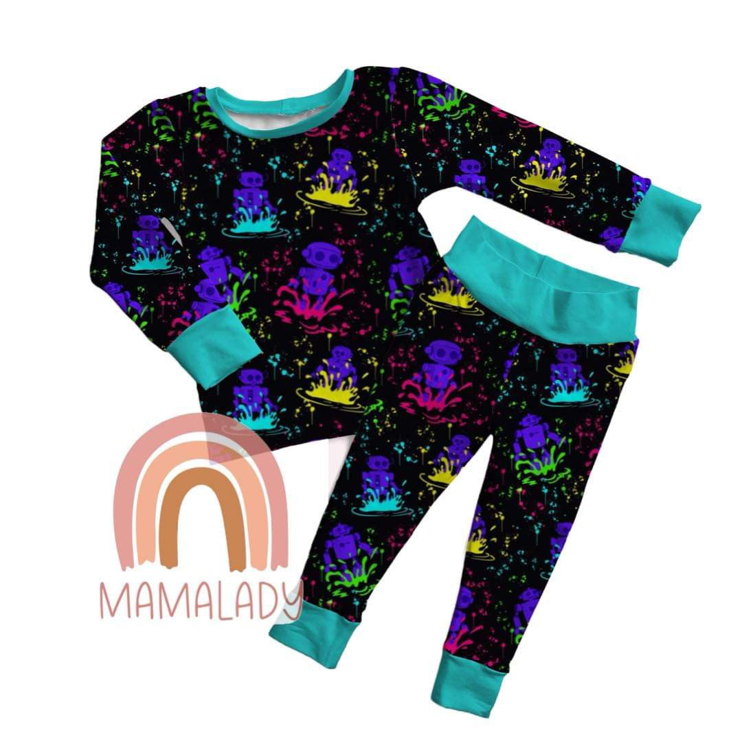 our neon robots print two piece bamboo pajamas laying on a white background with our mamalady logo in the corner