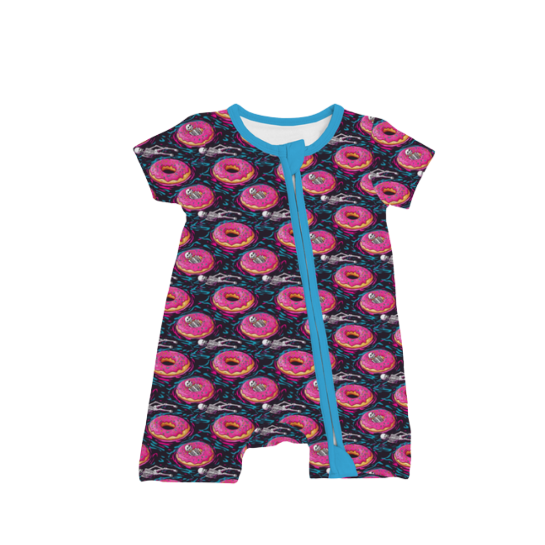 Ghoulish Glaze Halloween bamboo zipper sleeper with pink donuts sprinkles and skeletons two way zipper fold over feet and cuffs